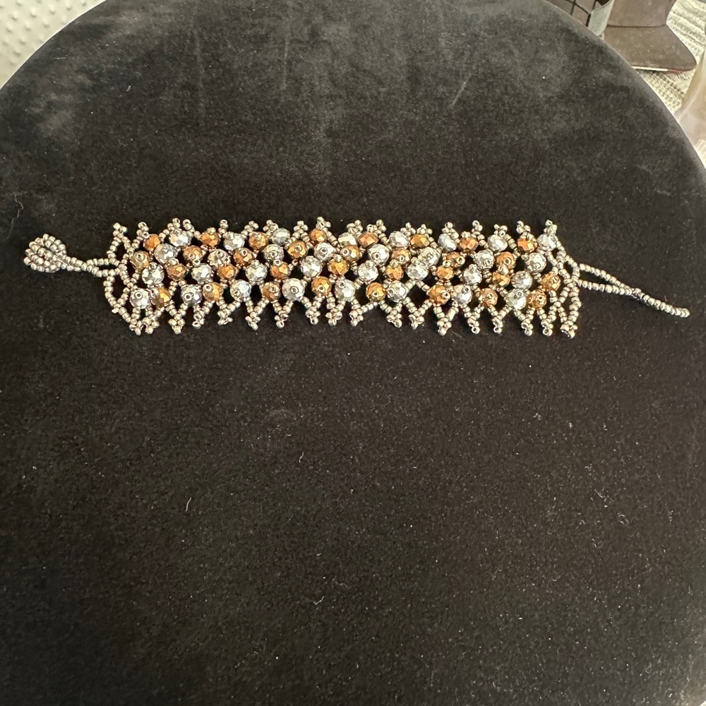 Elegant Gold and Silver Beaded Bracelet